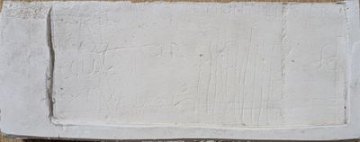 une photo d'un morceau de plâtre blanc sur un mur