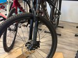 a bike that is sitting on a stand in a store