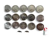 an image of a group of coins sitting on top of a white surface
