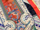 a lot of different colors and patterns on a table