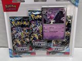 two packs of pokemon trading cards are in a white box