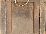 a picture of an old wooden frame with a handle