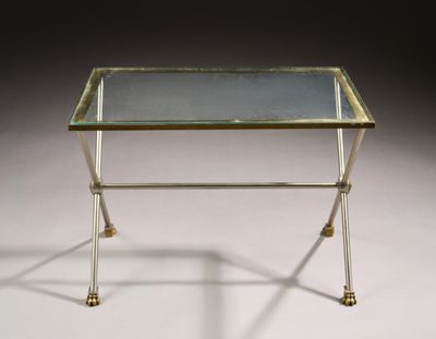 a brass and glass side table with a glass top