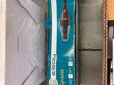 a box that has a vacuum on top of it