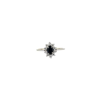 an image of a black and white diamond ring on a white background