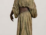 a statue of a man with a dog on a table