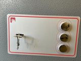 a close up of a metal box with buttons on it