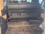 the back of a van with the door open and the back of the van with the door open