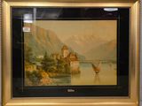 tableau encadré représentant un château au bord d'un lac