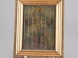 an old picture frame with a painting of a woman on it