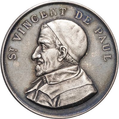 une pièce de monnaie ancienne avec le portrait d'un homme coiffé d'un turban