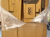 many boxes that are sitting on a pallet in a room