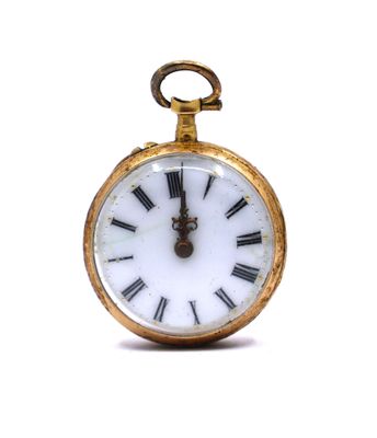 a gold pocket watch with roman numerals on the face