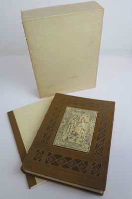 two books sitting on a table next to each other