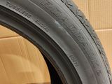 a close up of a tire on a cardboard box