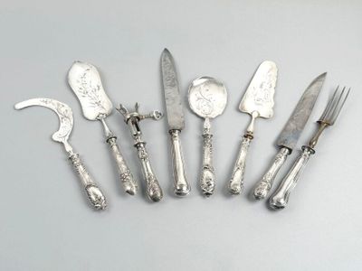 six pieces of silverware are arranged in a row on a table