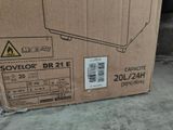 a cardboard box with a picture of a microwave on it