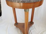 an image of a small table with a marble top on a white background