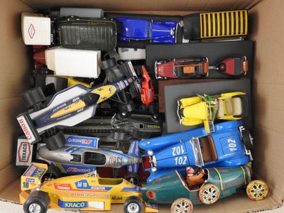 a box full of toy cars and trucks in it