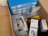 a box full of electronic equipment sitting on the floor