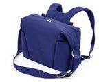 une image représentant un sac bleu muni d'une bandoulière