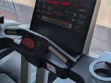 a close up of a tread on a machine in a gym