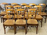 a lot of chairs that are lined up together