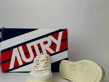 an image of a pair of shoes sitting on top of a box