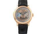 une image d'une montre-bracelet en or avec un bracelet en cuir noir