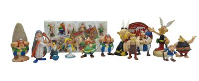 many figurines of cartoon characters in a row