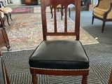 a chair that is sitting in the middle of a room