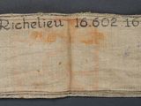 a close up of a piece of cloth with writing on it