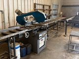 a picture of a man working on a machine in a factory