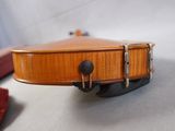 a violin that is sitting on a table