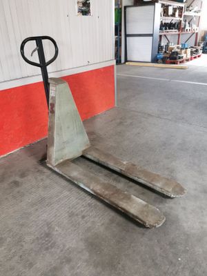 a fork on a pallet in a garage