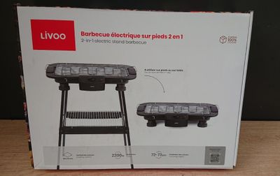 image encadrée représentant un barbecue surmonté d'une grille