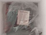 a plastic bag with a warning sign inside of it