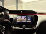 the interior of a car with a digital display in the center of it