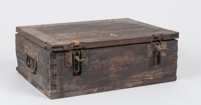 an old wooden box with a latch on it