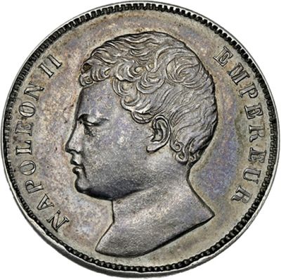 une pièce en argent portant le portrait d'un homme