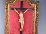 a picture of a crucifix hanging on a wall