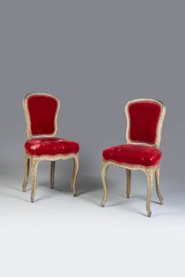 pair of louis xv style chairs with red velvet upholstered seats
