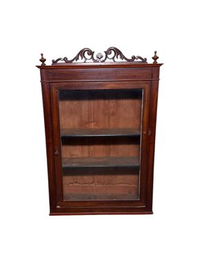 an image of a wooden cabinet with a glass door and shelves