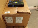 a box on a pallet with a laptop on it