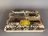 a box with a train set on it on a table