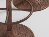 three metal stools that are sitting on a white surface