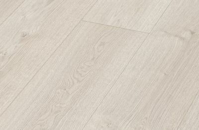 un gros plan sur un parquet blanc au fini clair