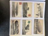 a picture of a collection of old photographs on a table