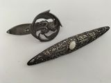 pair of antique silver plated hair clips and a broocher