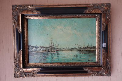 a picture of a painting hanging on the wall